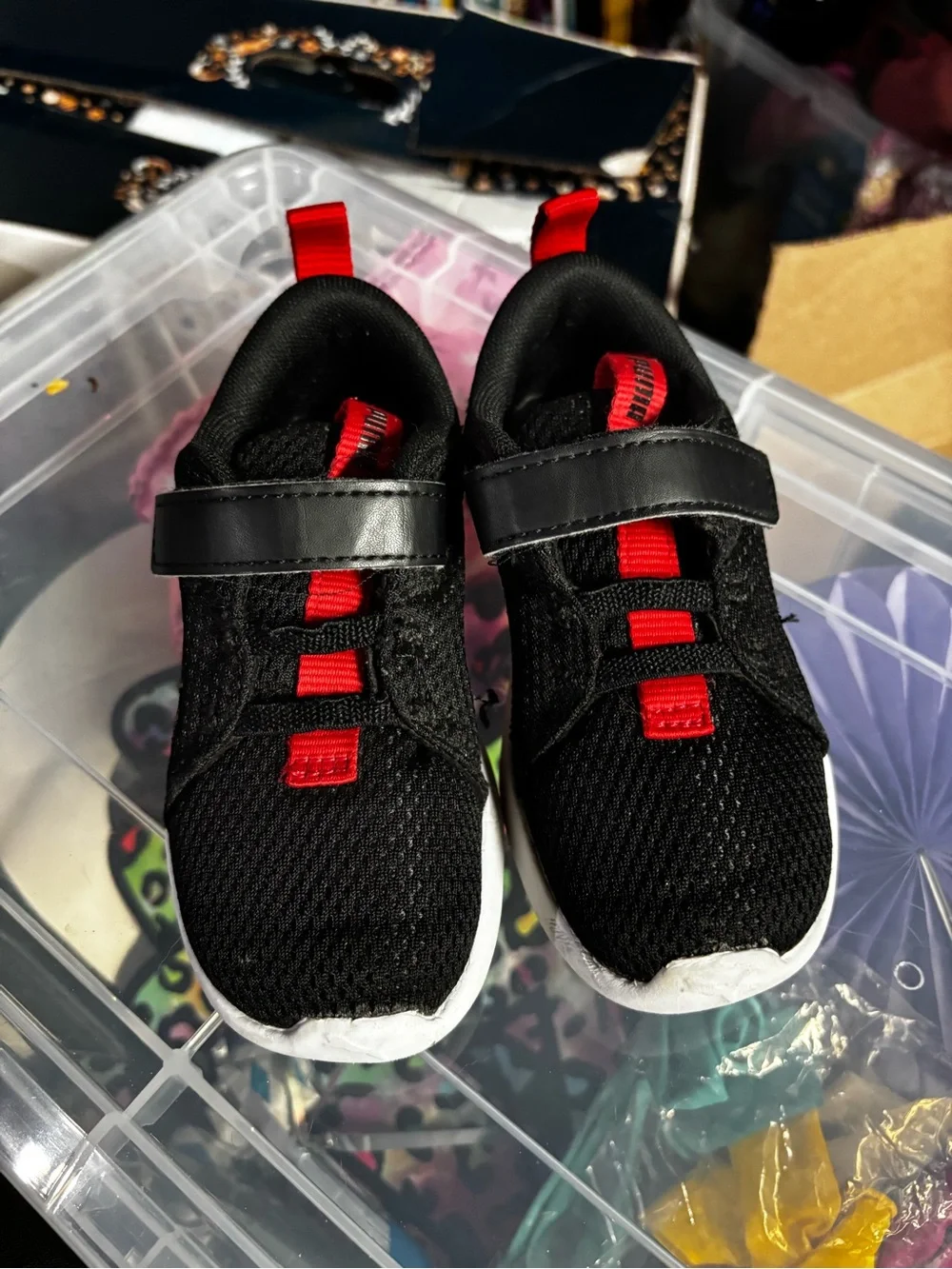 Puma Kids Black Sneakers with Red Accents